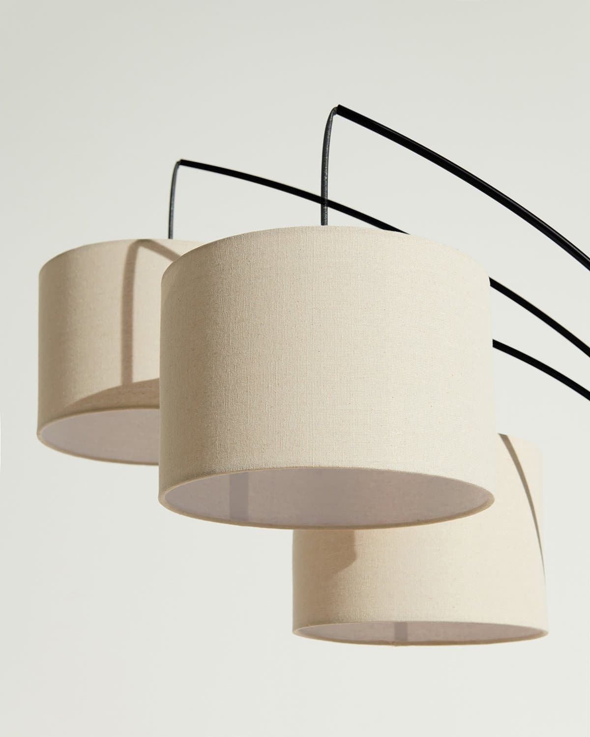 Glowmere Trilage Three Light Adjustable Arm Floor Lamp in black