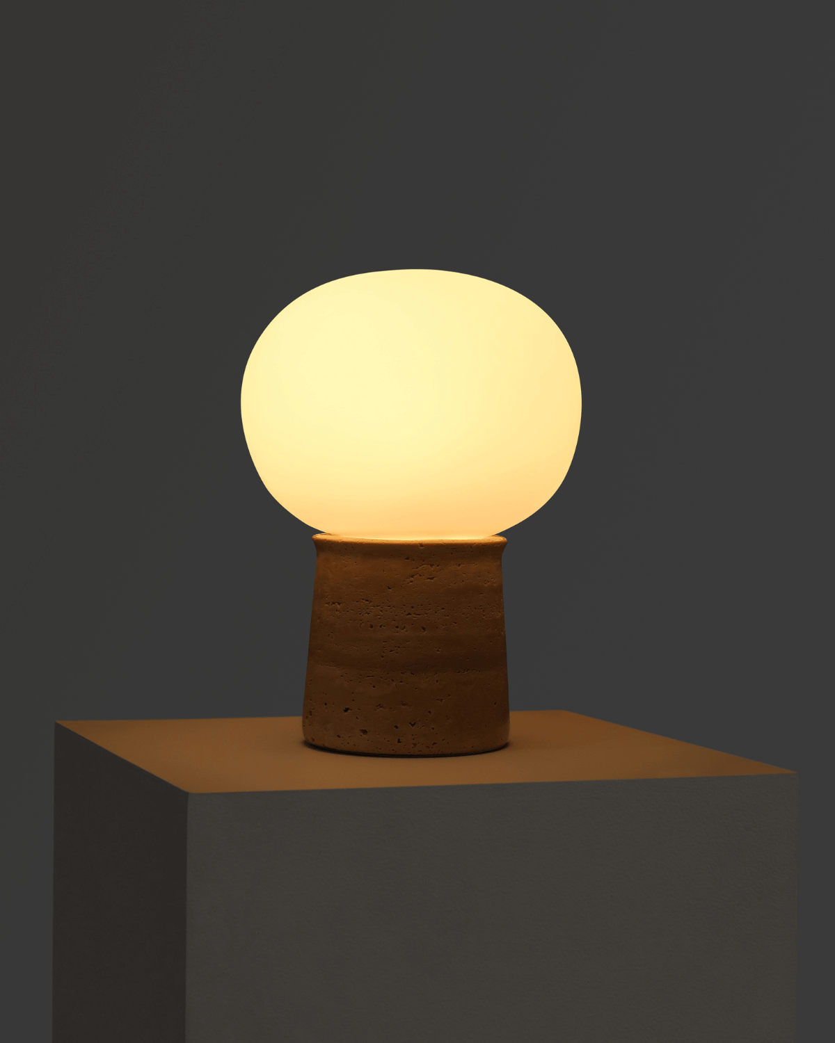 Glowmere Neptune Travertine Base Round Glass Shade Table Lamp view 3