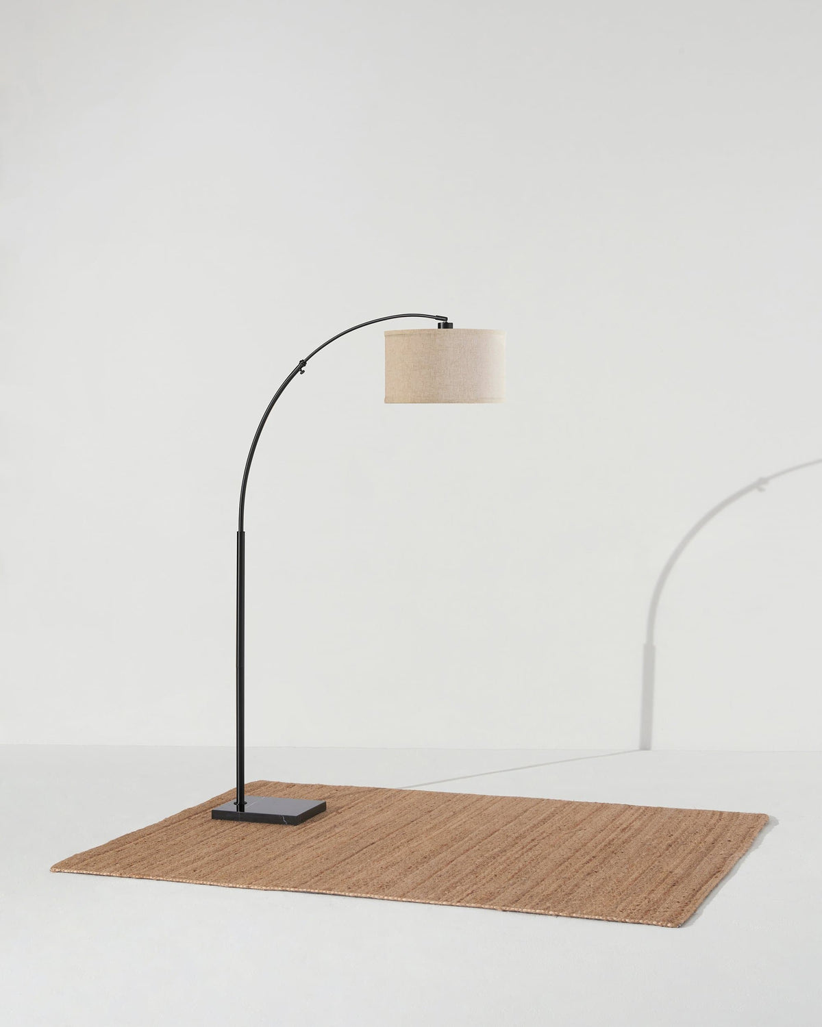 Glowmere Logan Marble Base Arc Floor Lamp with Footswitch in black