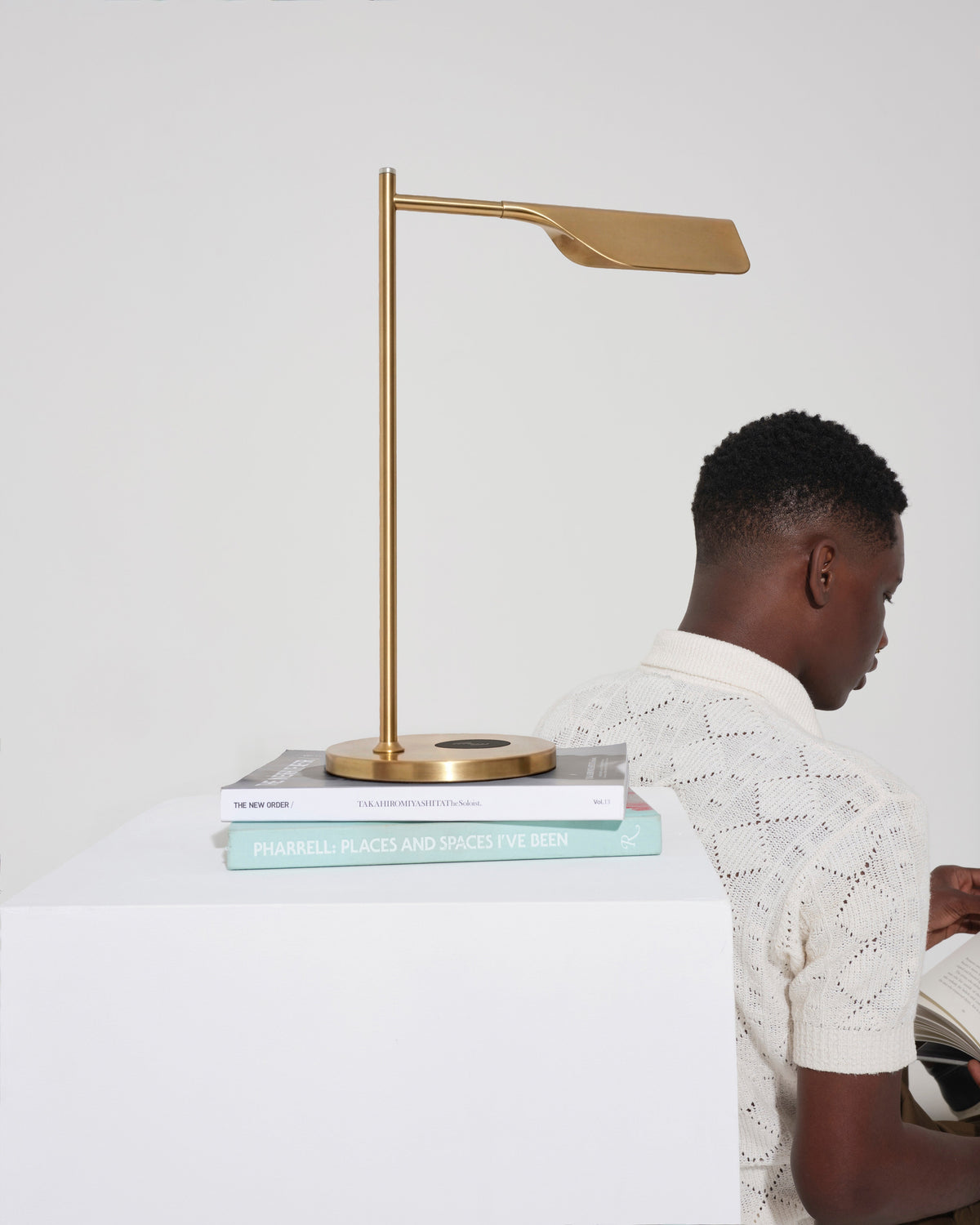 Glowmere Leaf Swing Arm Table Lamp with Wireless Charger in brass