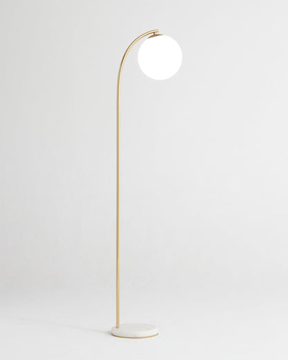 Glowmere Luna Drop Marble Base Glass Globe Floor Lamp in brass