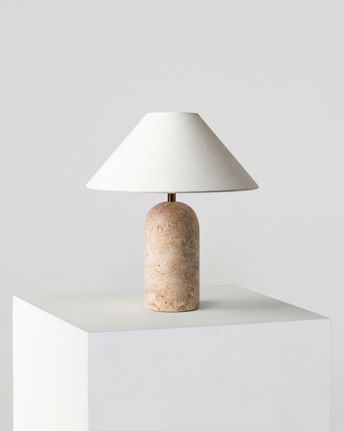 Glowmere Sansa Natural Stone Base A Line Shade Table Lamp in travertine