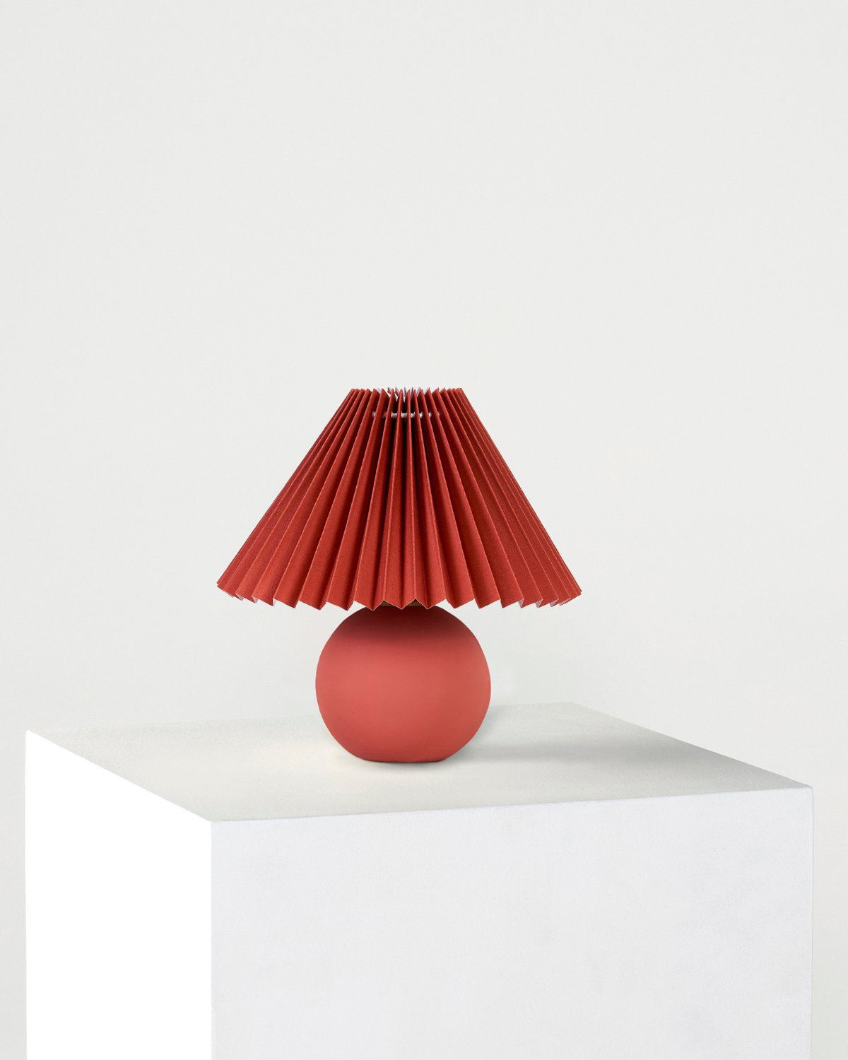 Glowmere Serena Ceramic Globe Base Table Lamp with Pleated Shade in red